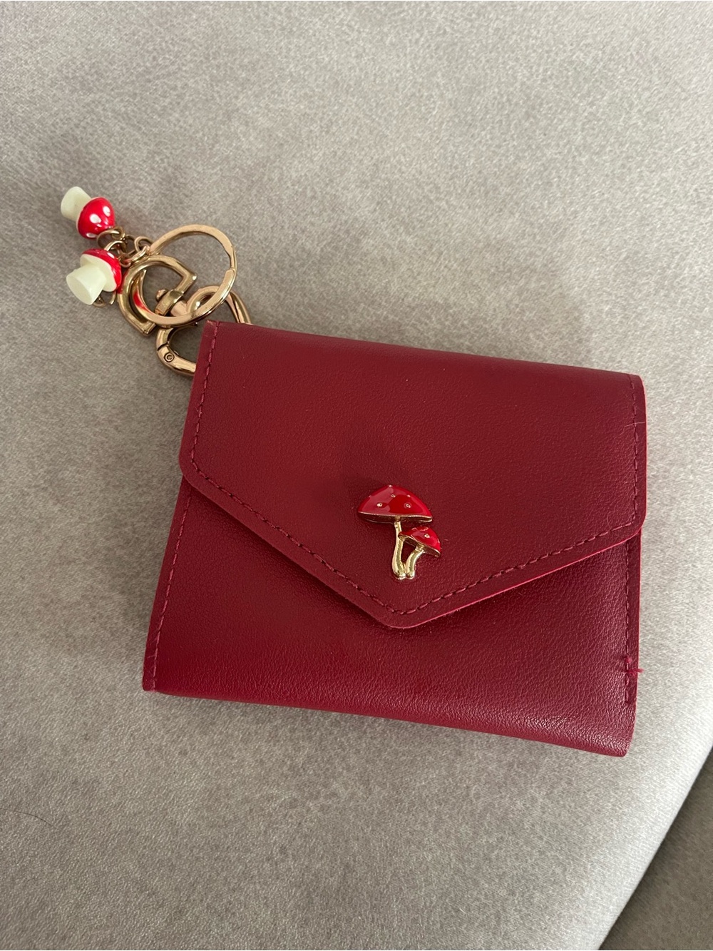 Compact Red Leather Wallet with Mushroom Charm
